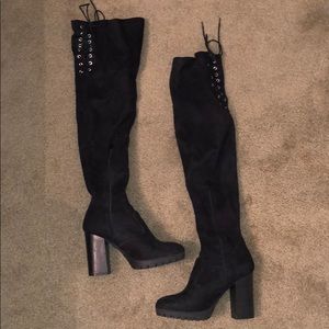 Gently worn thigh high boots with lace up back